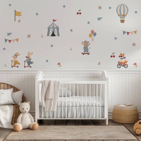 Nursery decorated with Little Rebels wall decals, featuring scooter riding bunnies, a cycling fox, balloons and playful vintage illustrations.