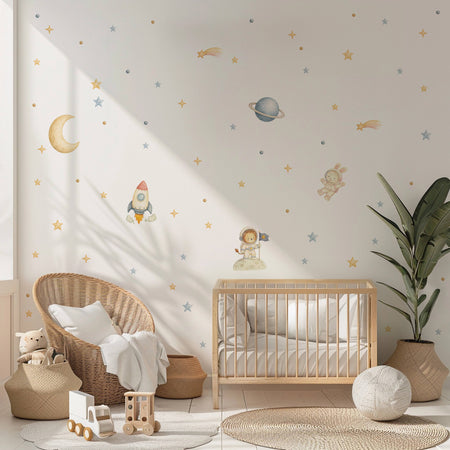 Nursery decorated with Space and Beyond removable wall decals in soft, gender-neutral colours by Lemon and Bubbles.